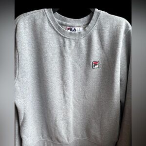 Women's XL grey Fila crew neck pullover sweatshirt with ribbed cuffs and bottom.